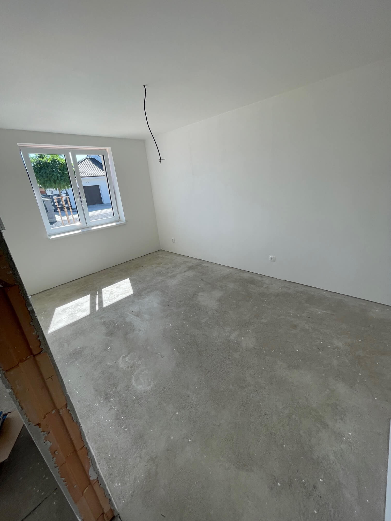 Predané: Na predaj novostavba posledné 4 trojizbové byty z trojdomov, úžitková 71,17m2, pozemok 177m2, v Kostolišti  s možnosťou dokončenia do štandardu-35