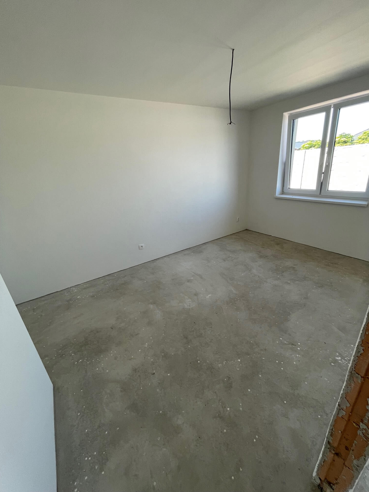 Predané: Na predaj novostavba posledné 4 trojizbové byty z trojdomov, úžitková 71,17m2, pozemok 177m2, v Kostolišti  s možnosťou dokončenia do štandardu-32